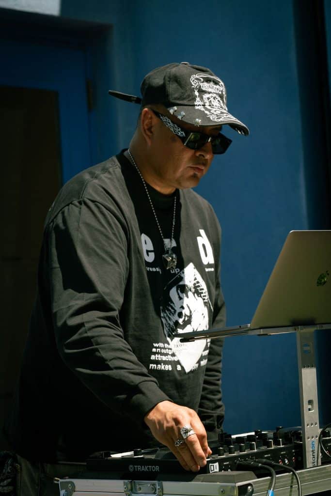 Randy Barton DJs during the afternoon session of Indigenous Fashion 4EVER. Photo by The Berry Pickers.