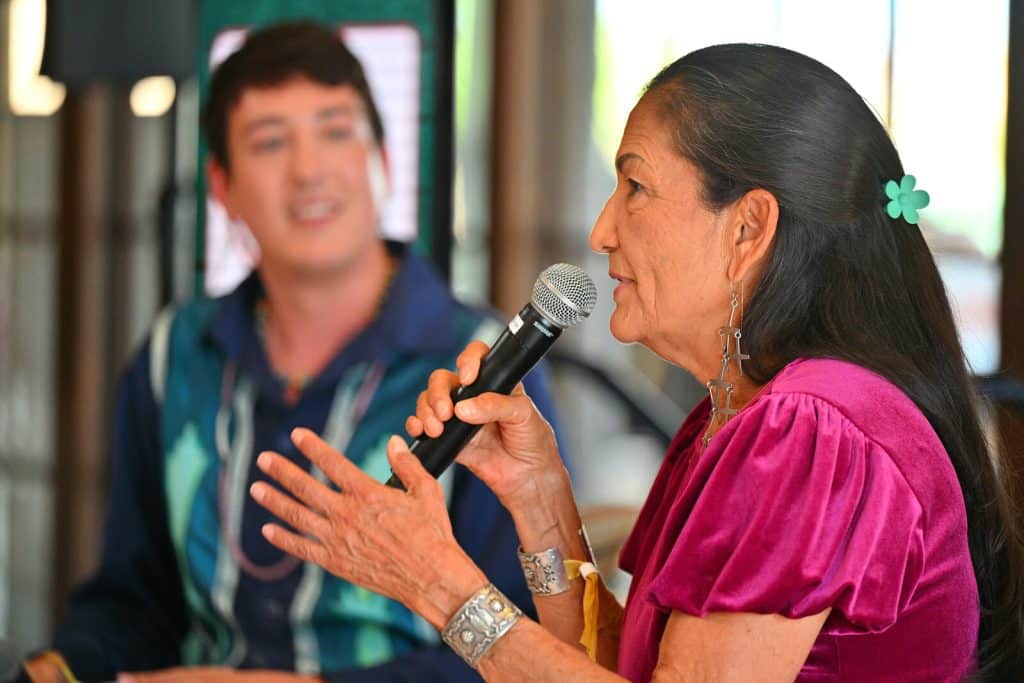 Deb Haaland speaks during the Indigenous House Women's Networking Breakfast