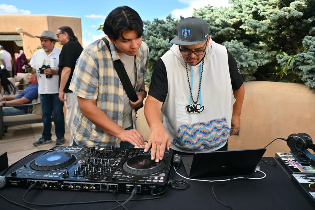 Actor Lane Factor and DJ emcee one attend the Indigenous House Networking Reception on August 14, 2026 in Santa Fe, New Mexico.